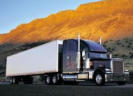 Enclosed Auto Transport vs. Open Carrier Shipping